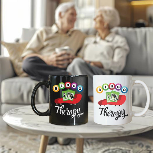 two coffee mugs sitting on top of a table