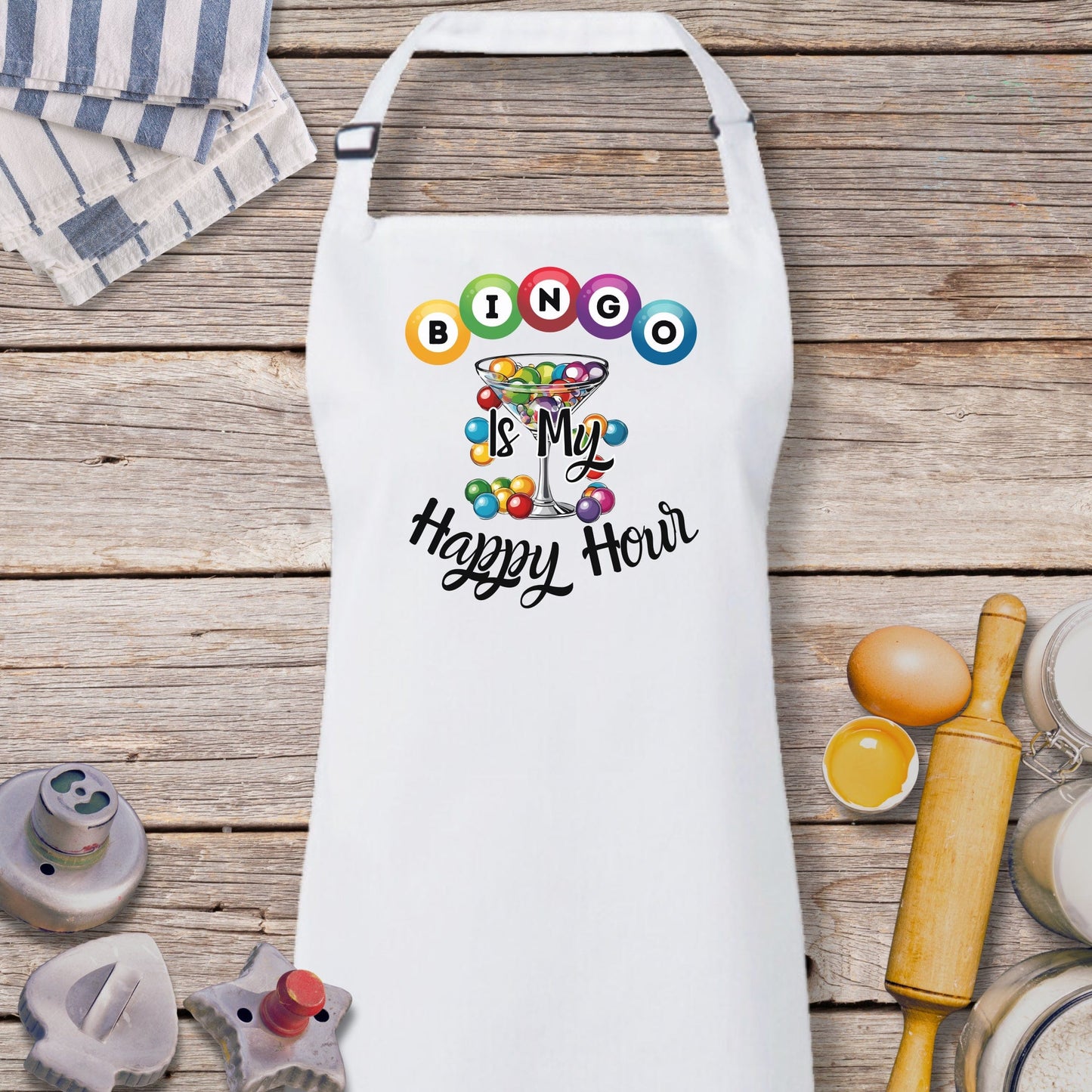 a white apron with a happy holi design on it