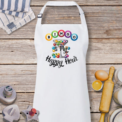 a white apron with a happy holi design on it