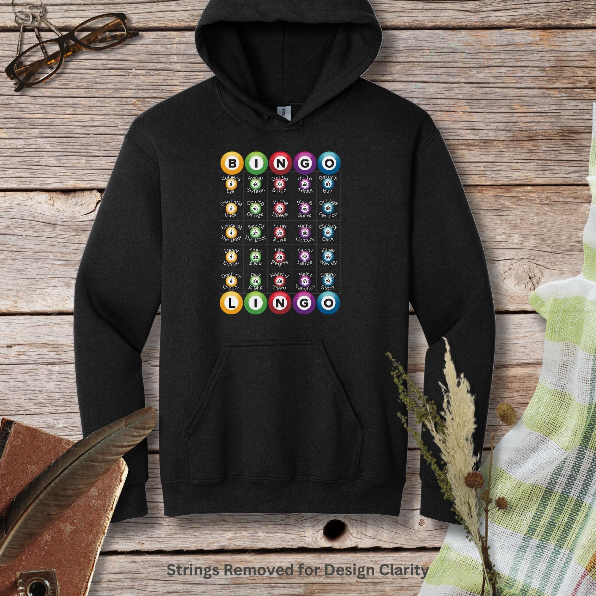 a black hoodie with a bunch of different colored circles on it