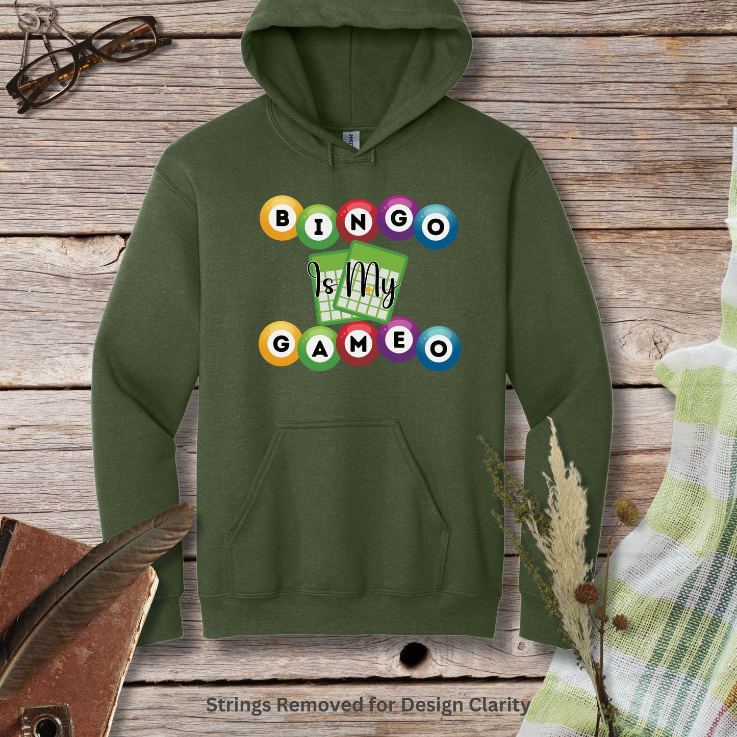 a green hoodie with the words game on it