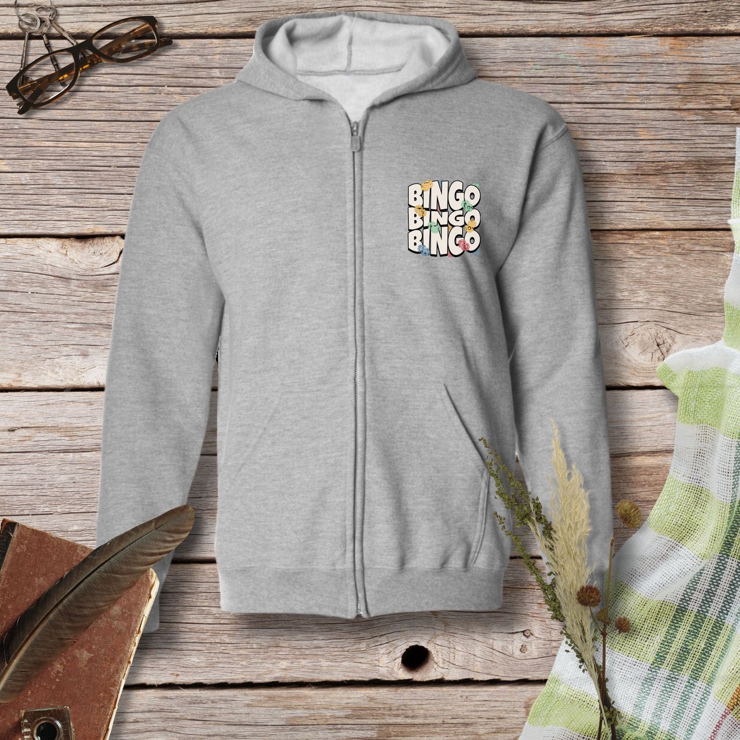 a grey hoodie with the words bingo bingo on it