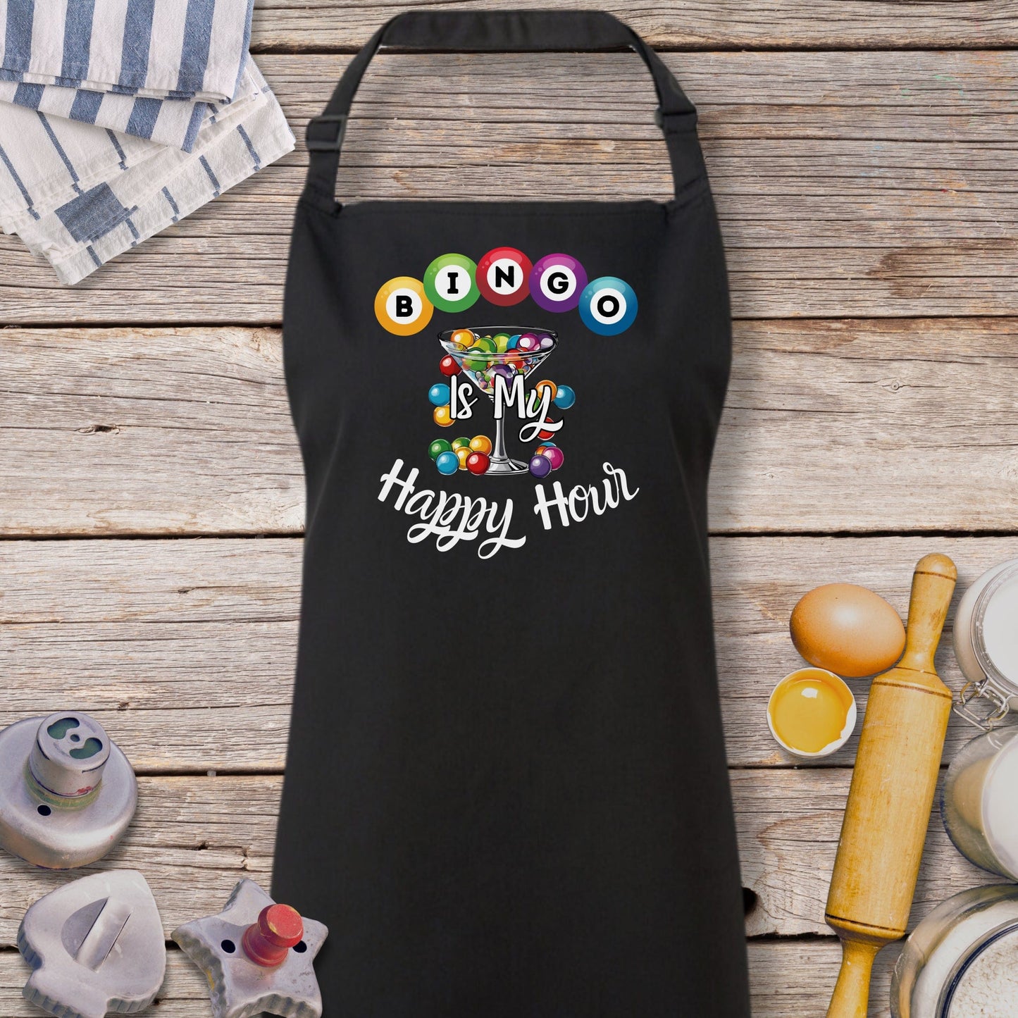 a black apron with a happy hour design on it