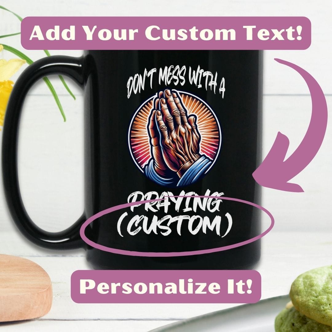 a black coffee mug with a praying custom design