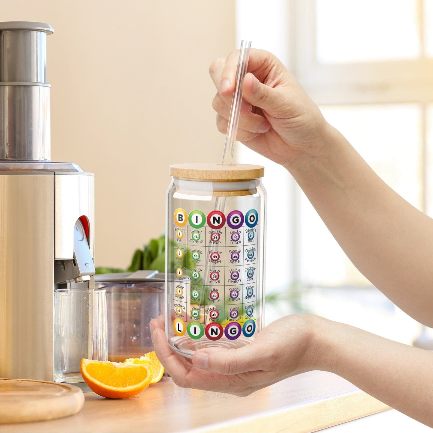 a person holding a glass jar with a straw in it