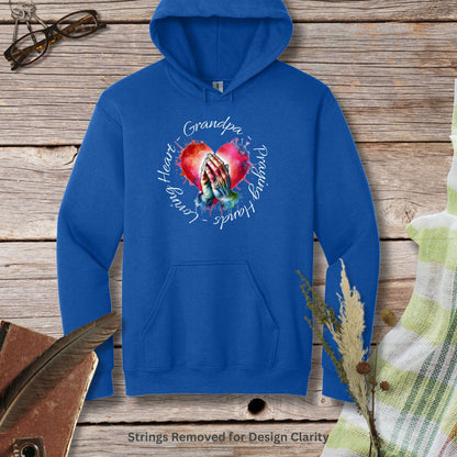 a blue hoodie with an image of a woman's hands holding a heart