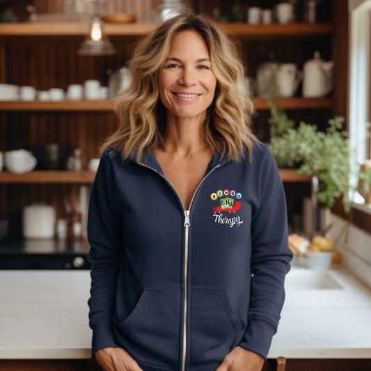 a woman standing in front of a kitchen counter