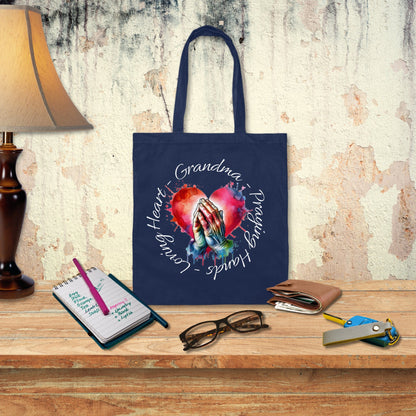 a blue tote bag sitting on top of a wooden table