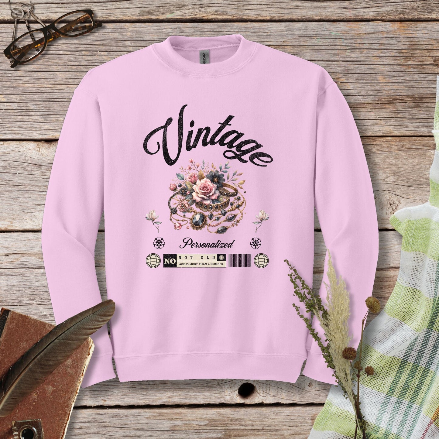 a pink sweatshirt with the words vintage printed on it