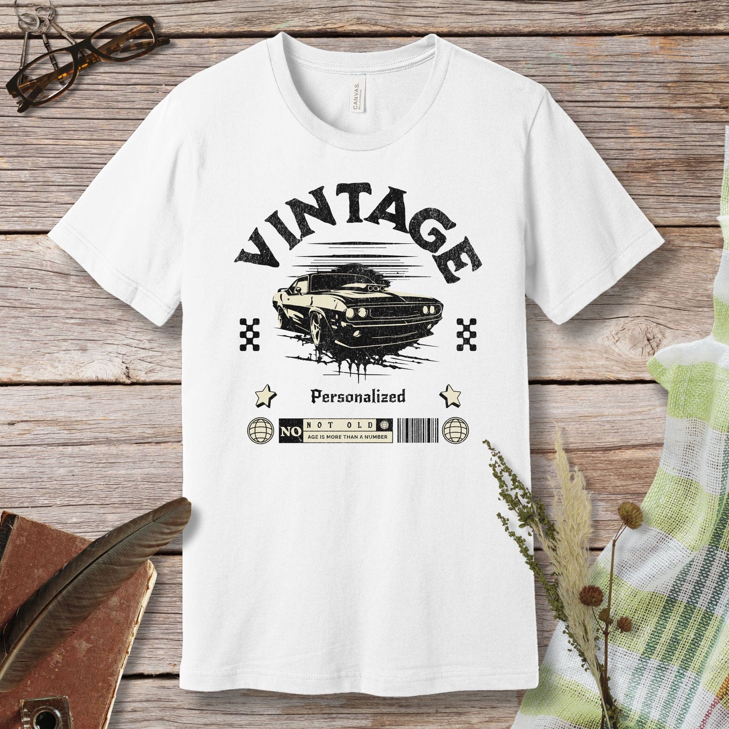 a white t - shirt with a picture of a car on it