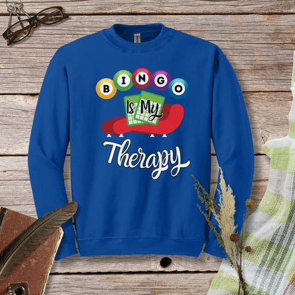 a blue sweatshirt with the words bingo is my therapy on it