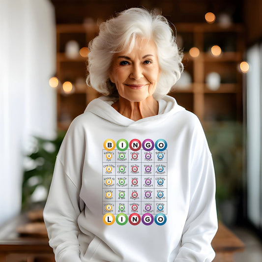 a woman wearing a white hoodie with colorful circles on it