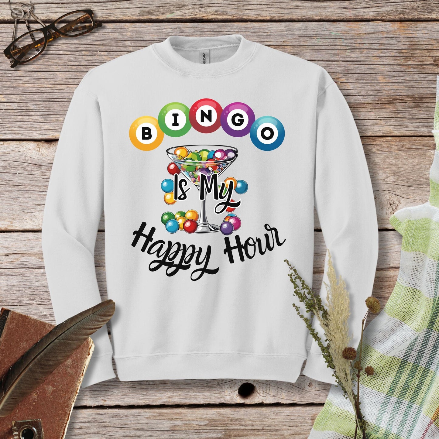 a white sweatshirt with the words bingo is my happy hour on it