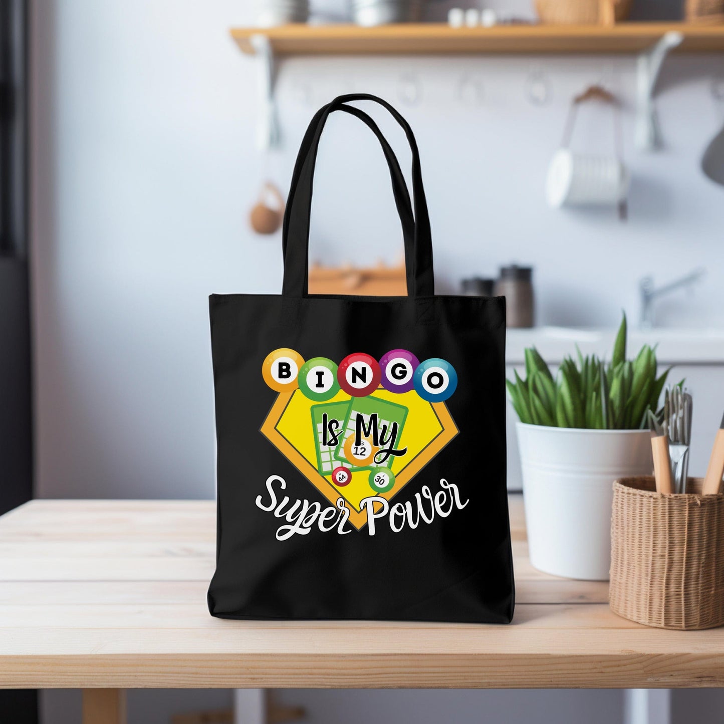 a black bag sitting on top of a wooden table