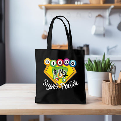 a black bag sitting on top of a wooden table