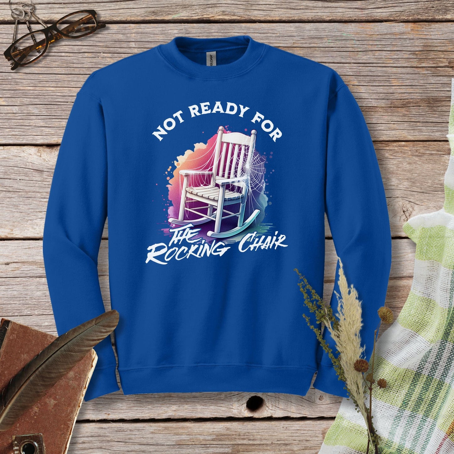 a blue sweatshirt that says not ready for the rocking chair