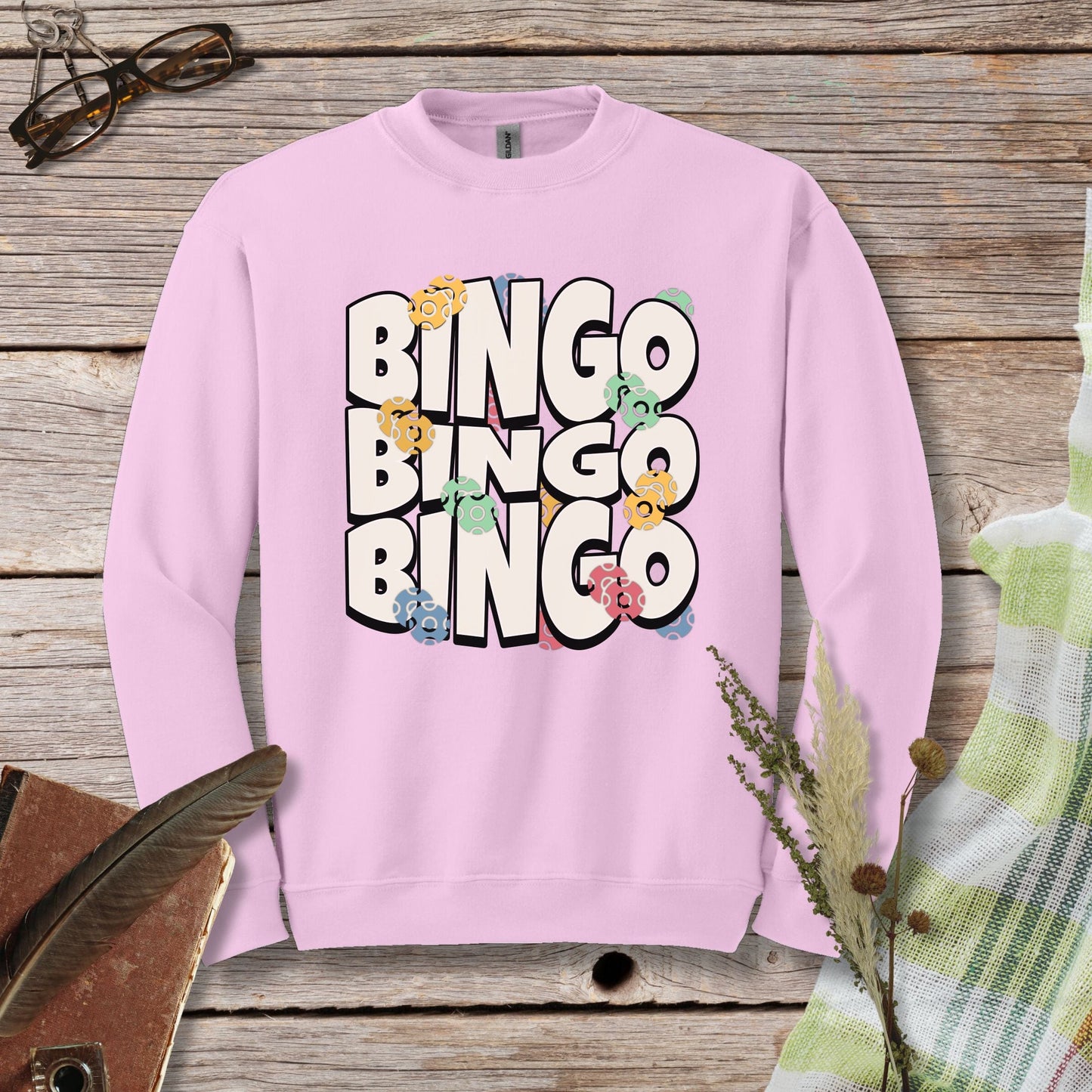 a pink sweatshirt with the words bingo bingo on it