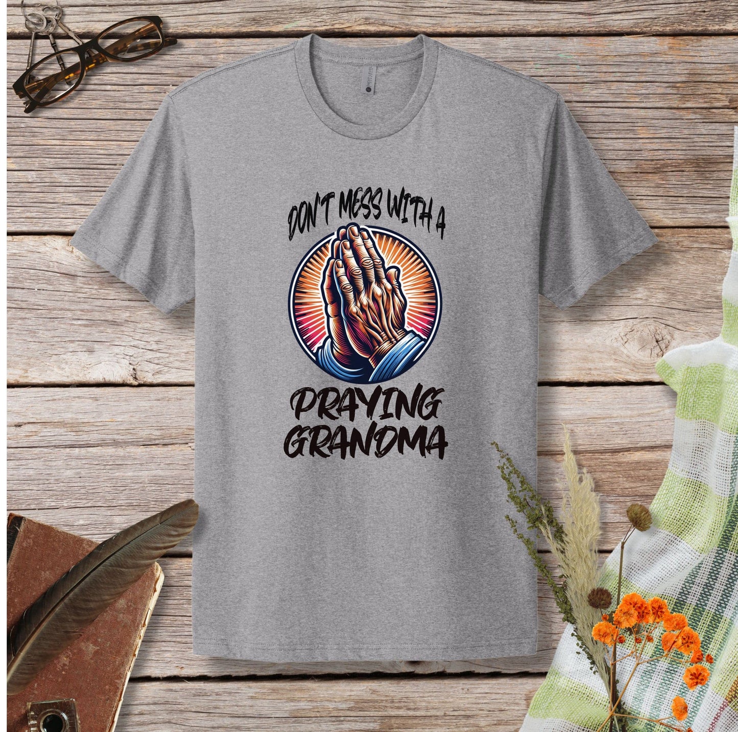 a t - shirt that says don't mess with a praying grandma