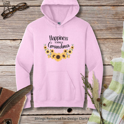 a pink hoodie with sunflowers and the words happiness is being grandma