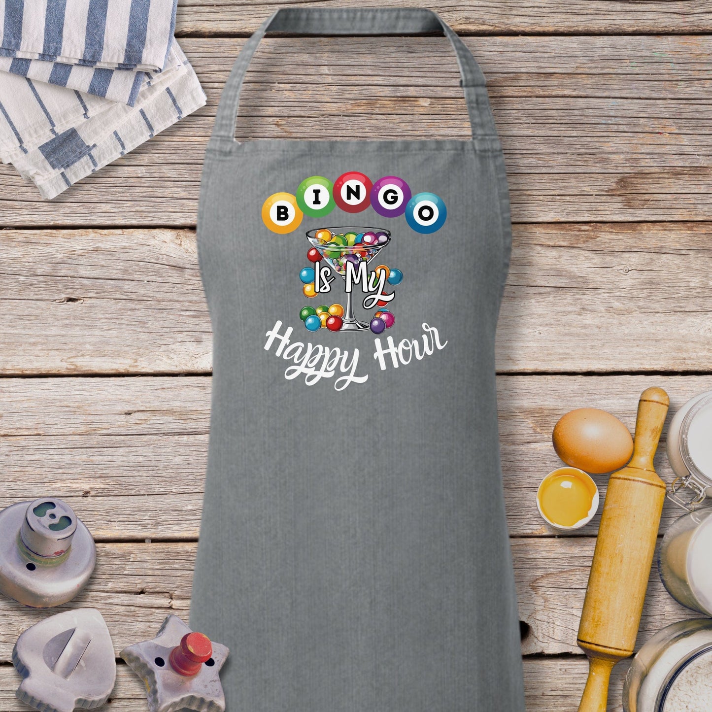 a gray apron with a picture of a happy mom on it