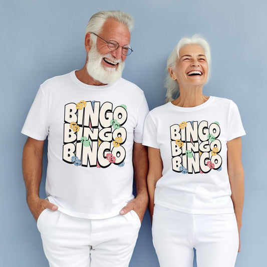 a man and a woman wearing matching t - shirts