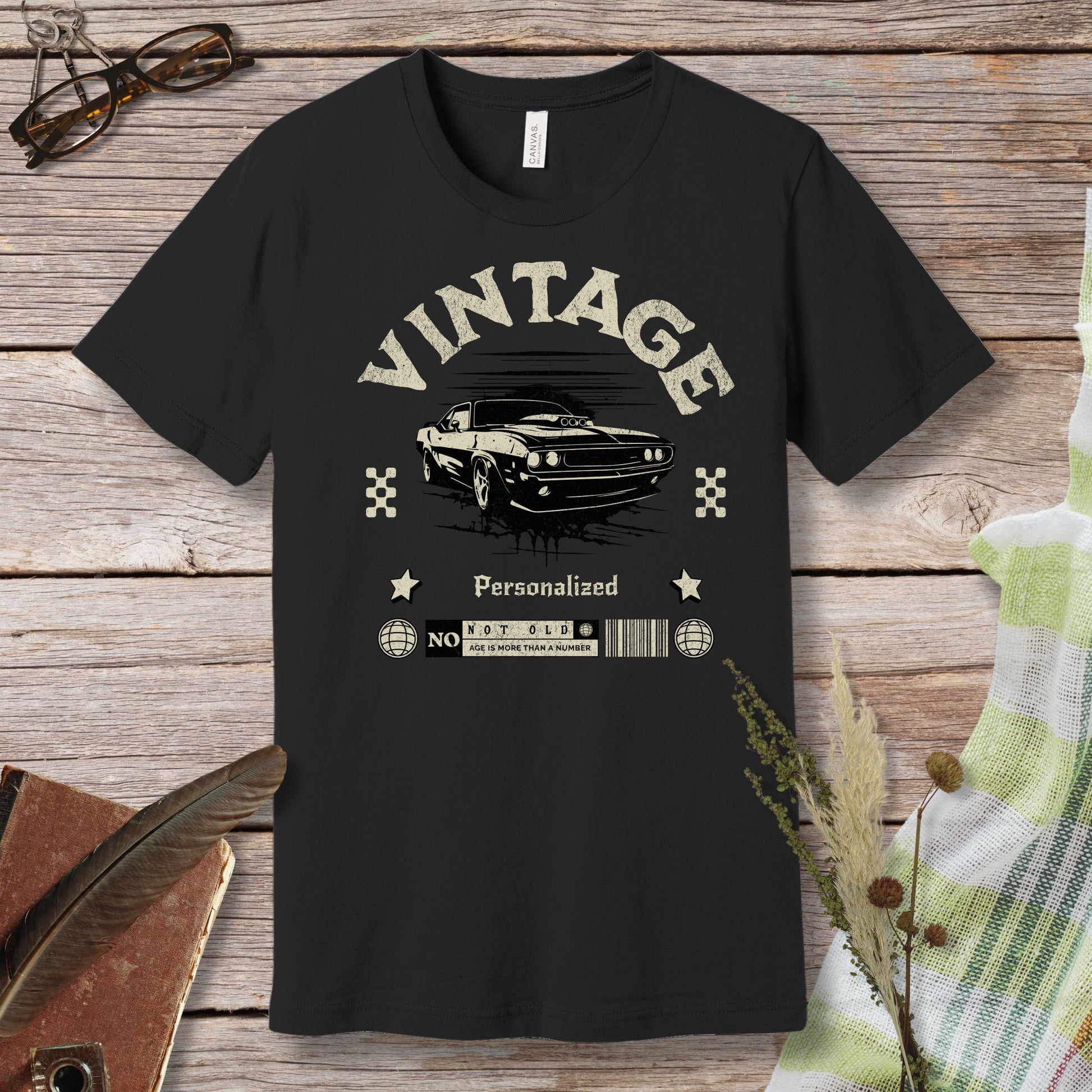 a black t - shirt with a picture of a car on it