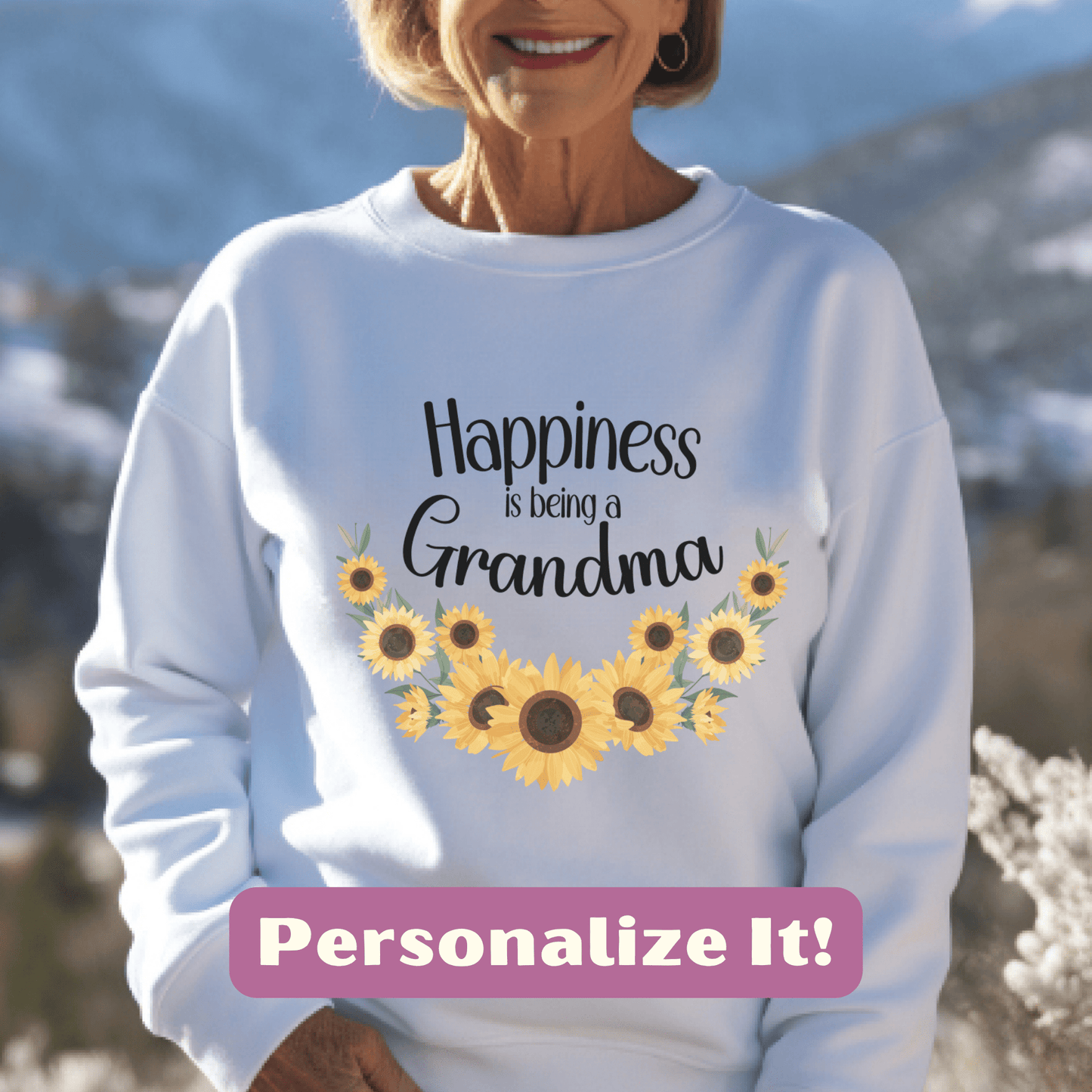 a woman wearing a sweatshirt that says happiness is being a grandma