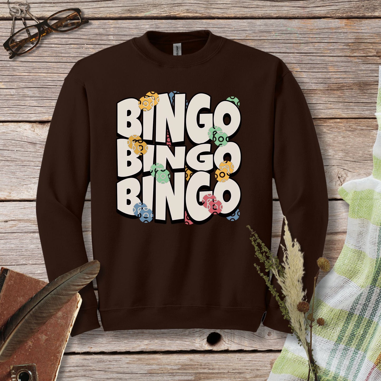 a brown sweatshirt with the words bingo bingo on it