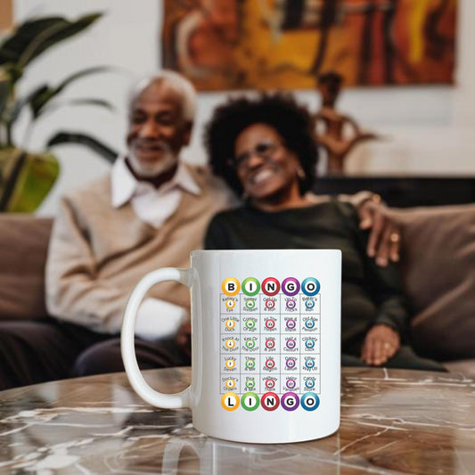 a couple of people sitting on a couch with a coffee mug