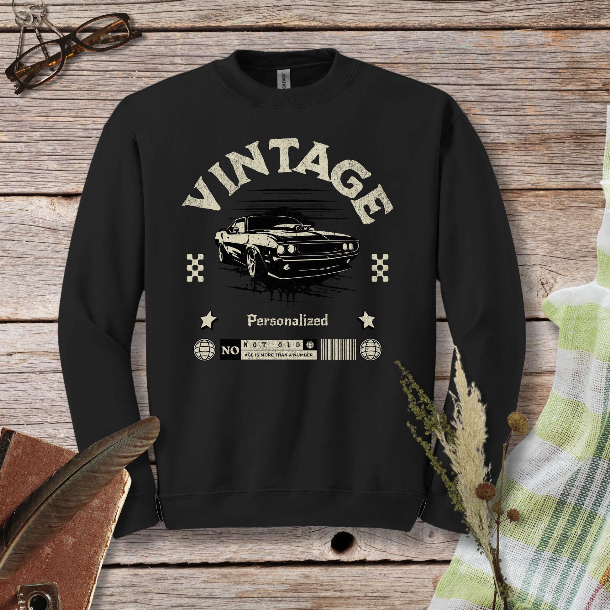 a black sweatshirt with a picture of a car on it