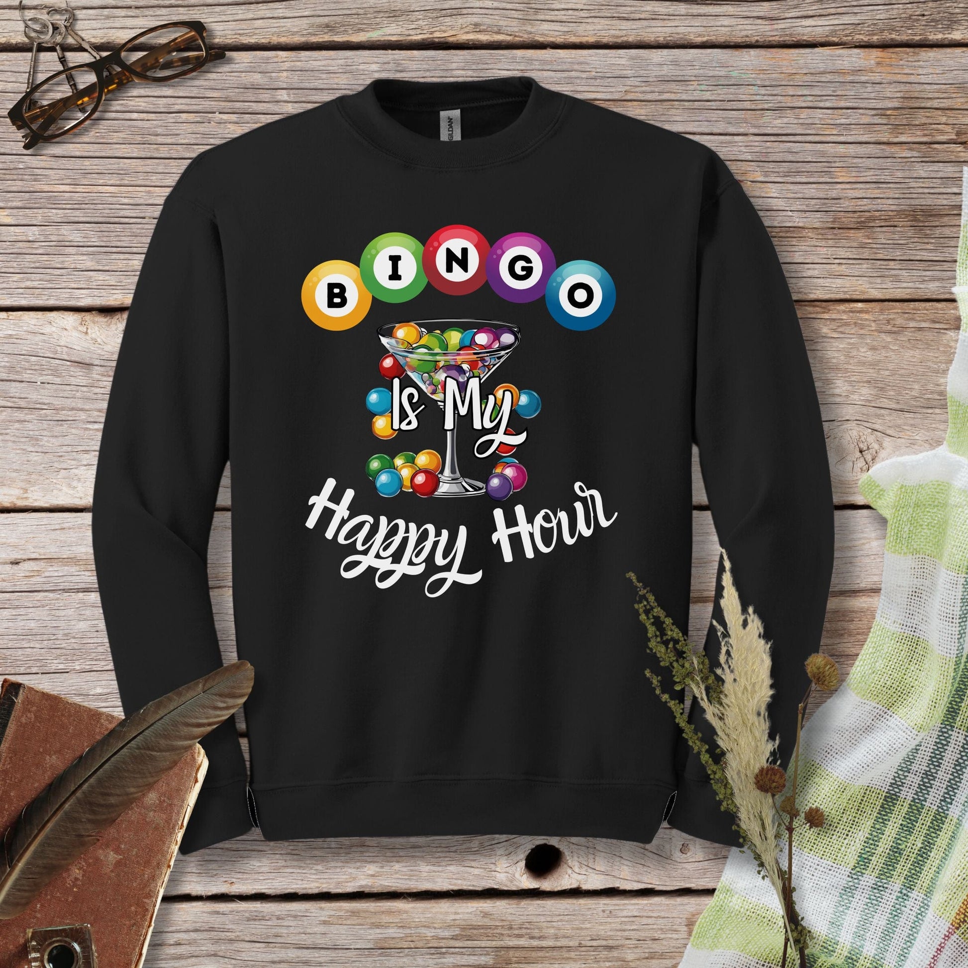 a black sweatshirt with the words bingo is my happy hour on it