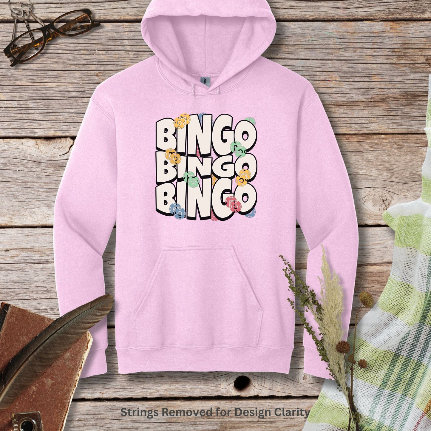 a pink hoodie with the words bingo bingo on it