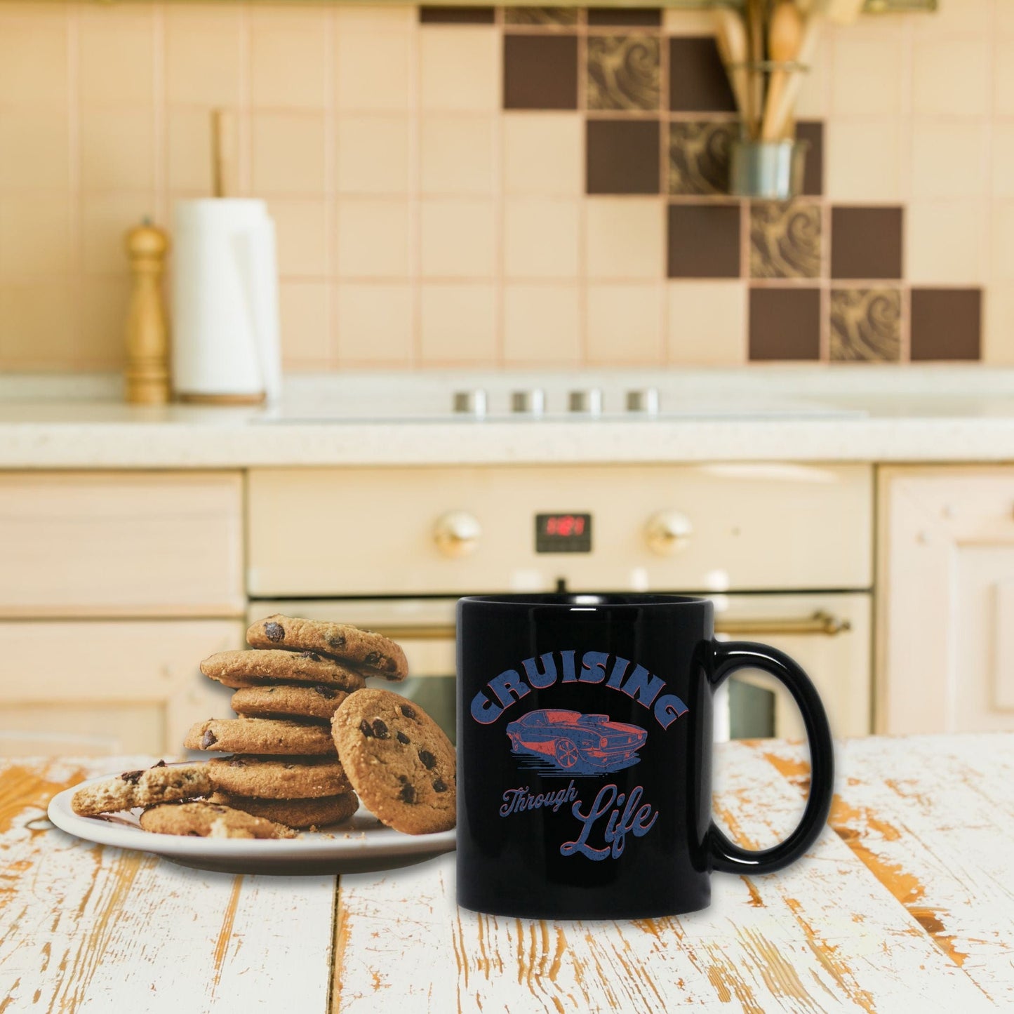 a plate of cookies and a mug on a table