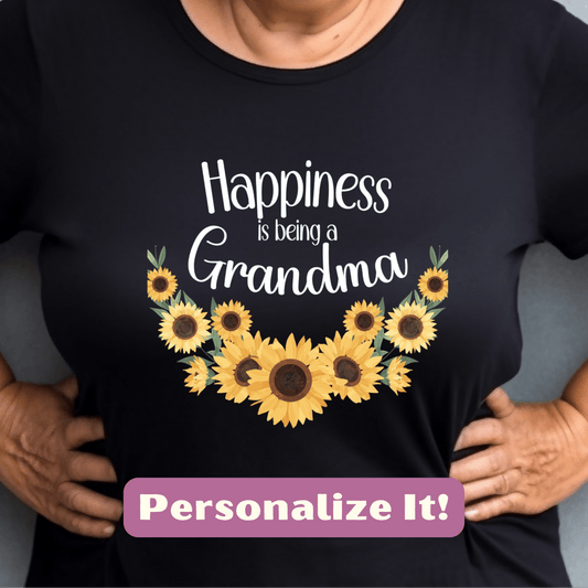 a woman wearing a t - shirt that says happiness is being a grandma