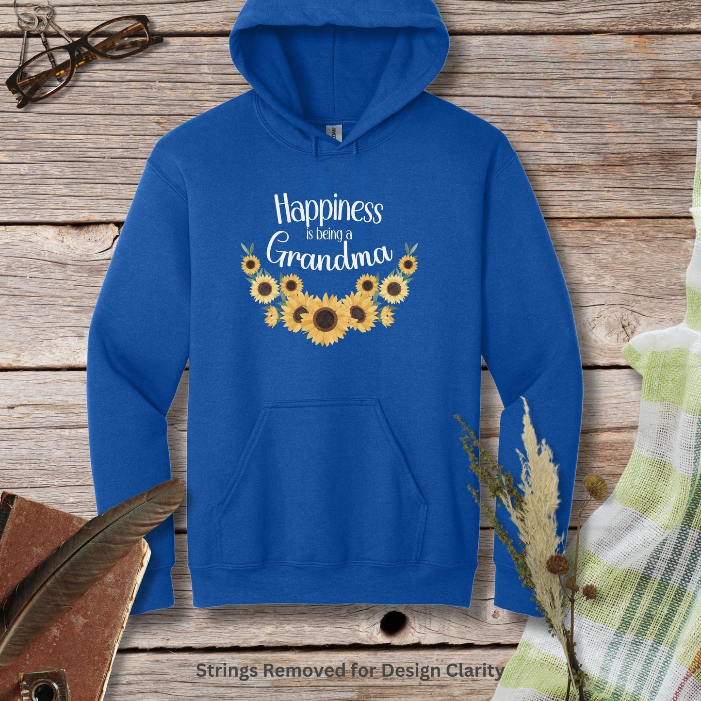 a blue hoodie with sunflowers and the words happiness and grandma on it