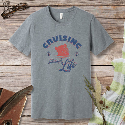 a t - shirt that says cruising through life next to a pair of glasses