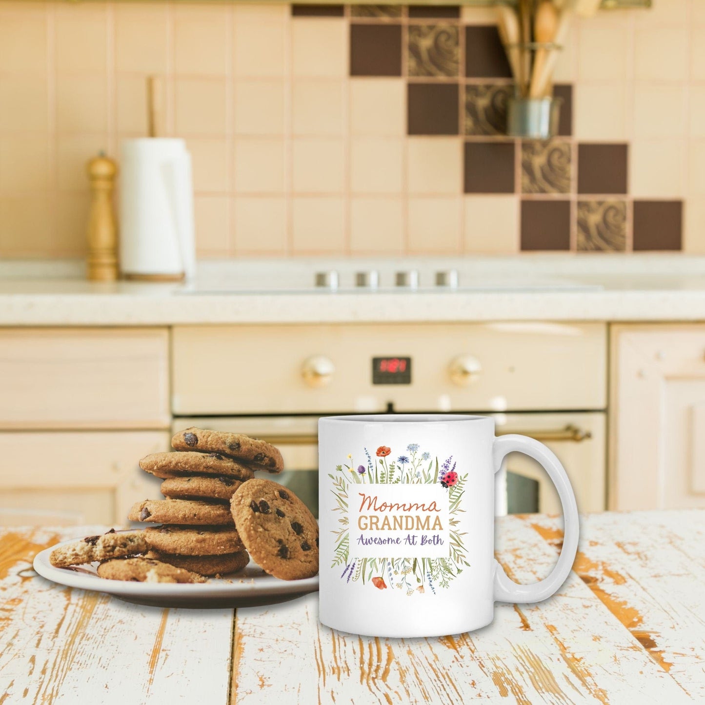 a plate of cookies and a mug on a table